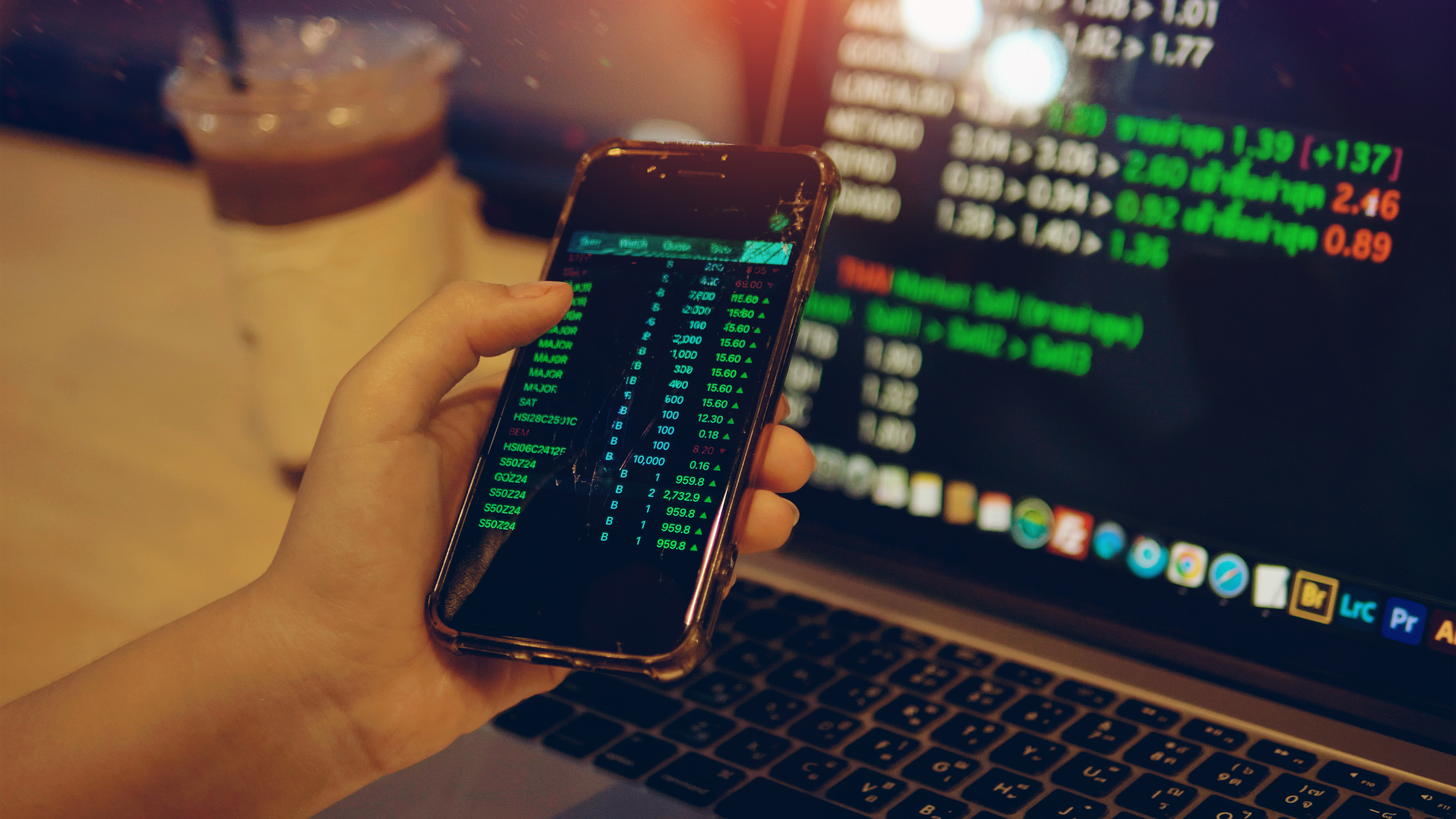 Financial traders and investors are planning their finances and buying stocks in the stock market via smartphones and laptops.